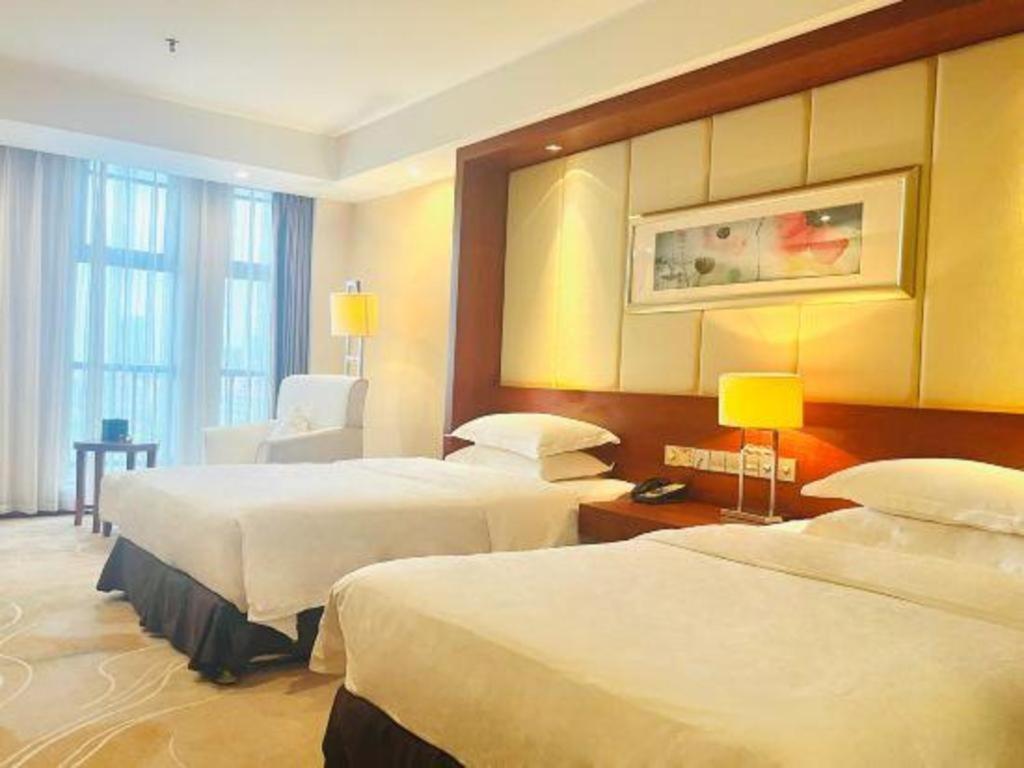 Grand Metropark Hotel Shangqiu Extérieur photo