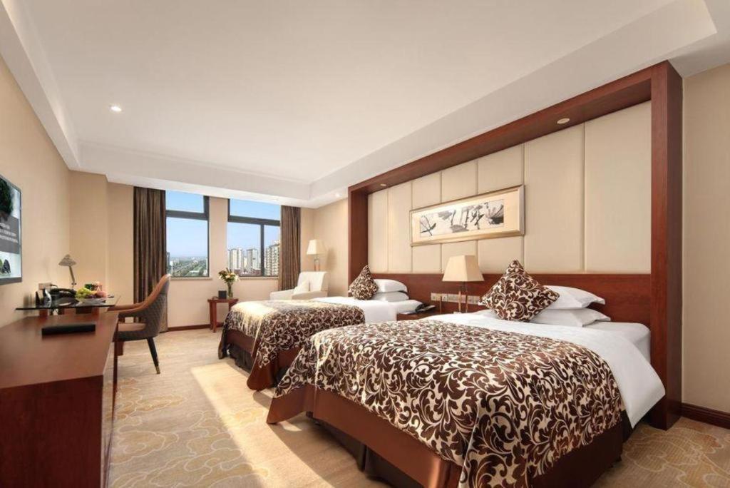 Grand Metropark Hotel Shangqiu Extérieur photo